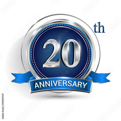 Celebrating 20th anniversary logo, with silver ring and ribbon isolated on white background.