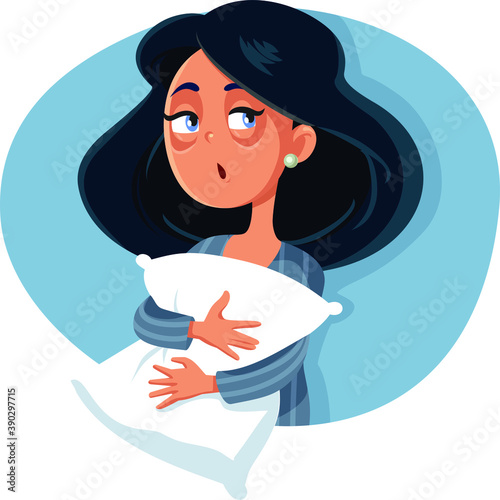 Sleepy Woman Suffering from Insomnia Holding Pillow
