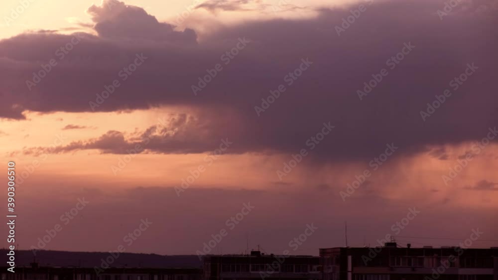 Evening city against the background of a scarlet sunset Evening city against the background of a scarlet sunset