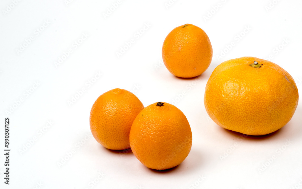 Tangerines on a white background, close-up, copy space, isolated Tangerines on a white background, close-up, copy space, isolated