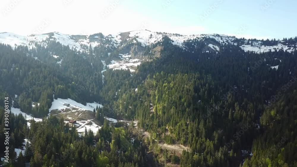 Secluded mountain chalet in wintery French Alps, aerial view Secluded mountain chalet in wintery French Alps, aerial view