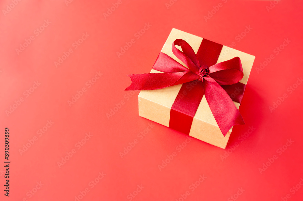 custom made wallpaper toronto digitalred stylish square beige box with red festive satin ribbon on red background with space for text. Festive ready made layout style minimalism monochrome