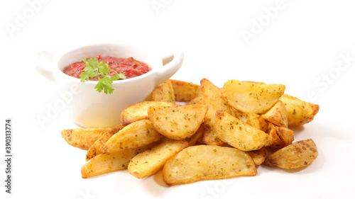 french fries and ketchup on white background