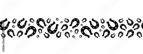 Lucky horseshoe. Good luck symbol. Silhouette. Repeating vector pattern. Seamless horizontal border. Isolated colorless background. Endless ornament. Template for web design, printing, advertising.