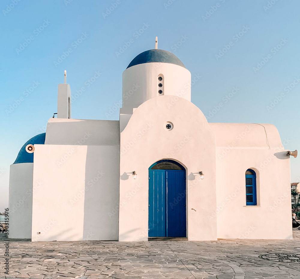 Cyprus, Protaras. Church of St. Nicholas in Cyprus. Blue and white Church on the coast of the Mediterranean sea. The Port Of Paralimni. Pernera.  Attractions Of