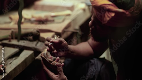 traditional manufacturing of keris handle at Terengganu malaysia with close up shot