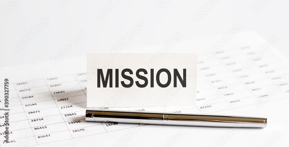 Text MISSION on stickers,pen on the background of documents. Financial bookkeeping, Accounting Concept. Text MISSION on stickers,pen on the background of documents. Financial bookkeeping, Accounting Concept.