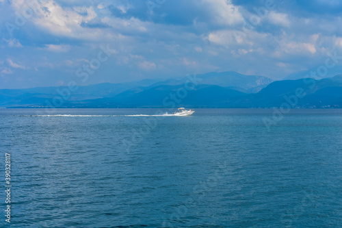 A speedboat sails the sea © Drago