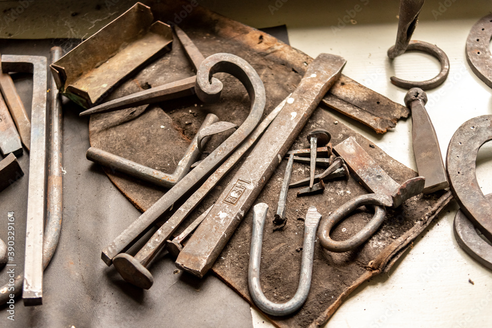 old rusty metal tools and pieces in a workshop old rusty metal tools and pieces in a workshop