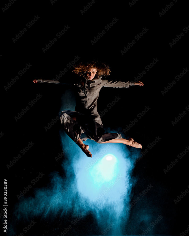 Woman having fun and jump high in the air