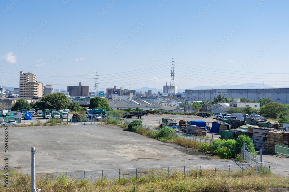 Obraz premium 新木津川大橋から見る資材置き場と住之江市街