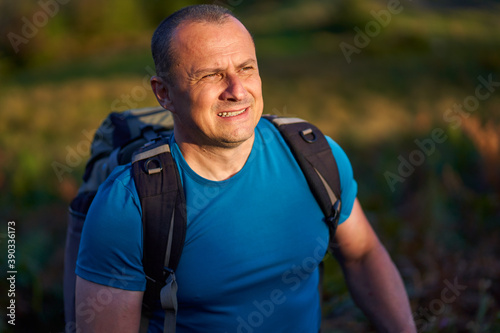 Man hiking into the forest