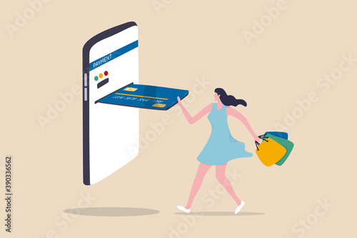 Online shopping credit card payment, e-commerce website purchase product concept, young lady purchasing clothes from website holding shopping bag virtually insert credit card to mobile for payment.