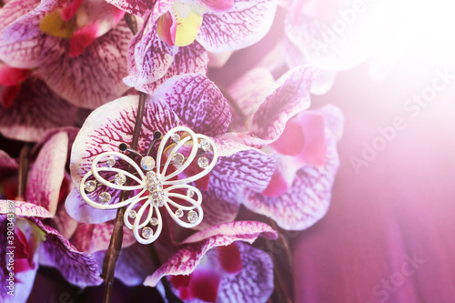 silver decoration and pink Orchid