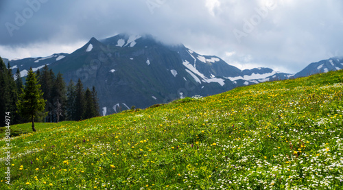 Picturesque view in the beautiful hills and mountains on the background. Colorful spring view. Beautiful outdoor scene, canton of Obwalden, Switzerland. Artistic style post processed photo. photo