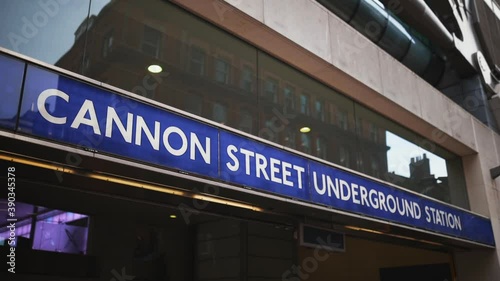 The Cannon Street underground station sign over the glass entrance of a building