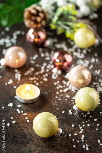 Christmas composition. Christmas glossy ball and a candle.