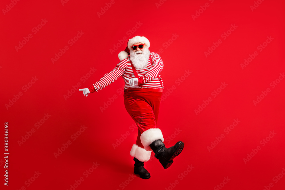 Full length body size view of his he nice handsome attractive cheerful Santa dancing having fun celebratory festal day x-mas occasion isolated bright vivid shine vibrant red color background - obrazy, fototapety, plakaty 
