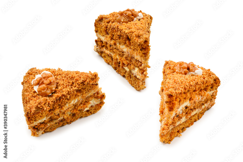 Peace of honey cake isolated on white background. Peace of honey cake isolated on white background.