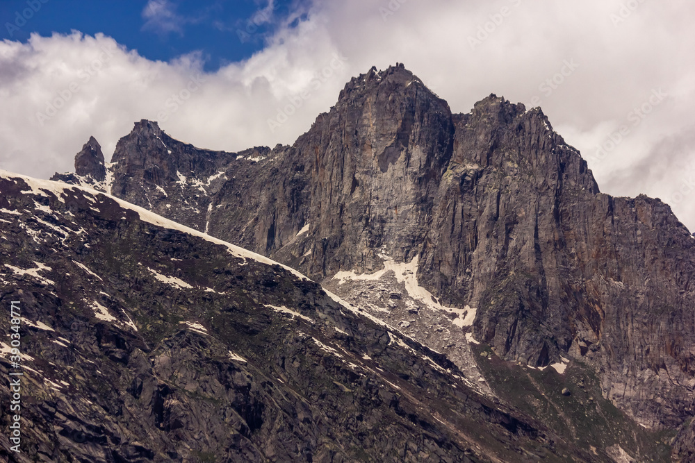 A high, rocky Himalayan mountain with jagged peaks around the Kunzum La pass in Himachal Pradesh.