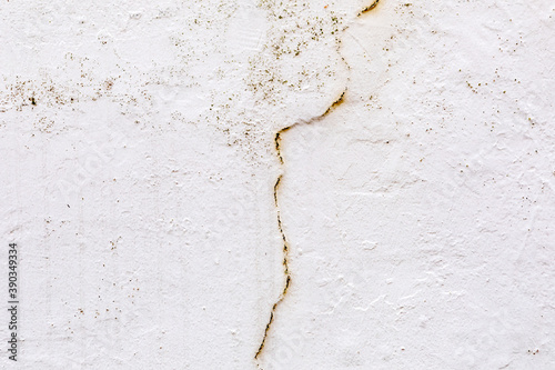 Surface of a wall with worn paint