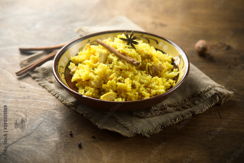 Delicious rice with spices in a bowl Delicious rice with spices in a bowl