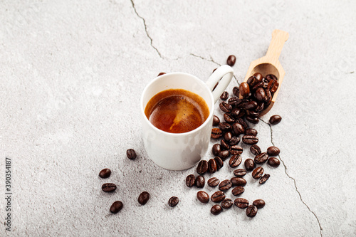 Brewed espresso coffee in a white mug