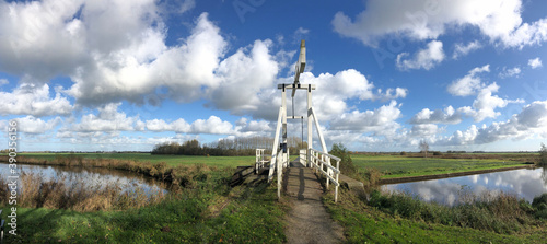 Panoramic from a bridge over a canal in a nature reserve around Wolvega