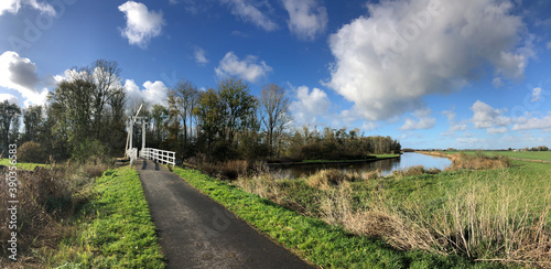 Panoramic from a bridge over a canal in a nature reserve photo