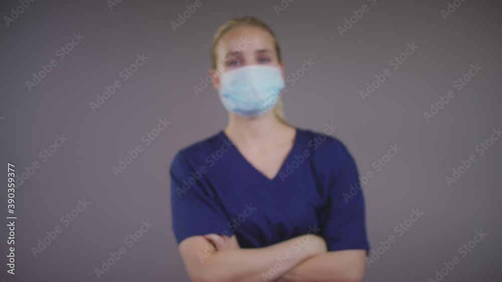 Young Blonde Caucasian Female Doctor Wearing Face Mask Young Blonde Caucasian Female Doctor Wearing Face Mask