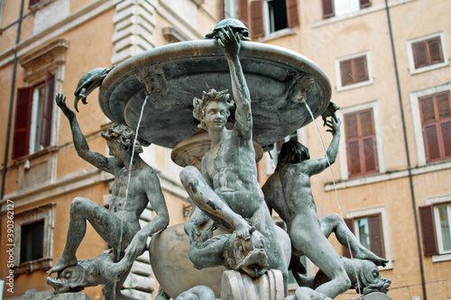 Fragment of the late Italian Renaissance Turtle Fountain (Fontana delle Tartarughe) located in Piazza Mattei, in the Sant'Angelo district of Rome, Italy. It was built between 1580 and 1588.  photo