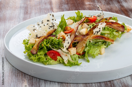 Salad with baked eggplant, mozzarella and romaine lettuce