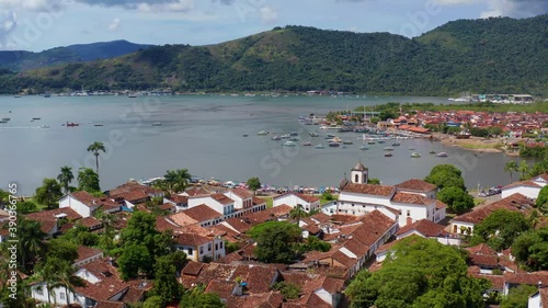Drone shot over the Paraty town, an old preserved Portuguese colonial on the coast of state of Rio de Janeiro, Brazil - dolly, aerial view photo