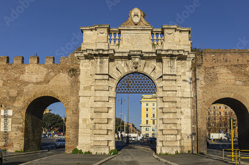 Aurelian Wall and Porta San Giovanni (San Giovanni gate, 1574) in city Rome. Italy.