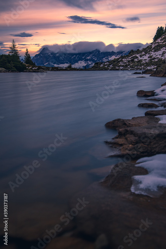 sunset over the lake in the austrian alps at the dachstein region in styria, austria with a beautiful view of the alps 