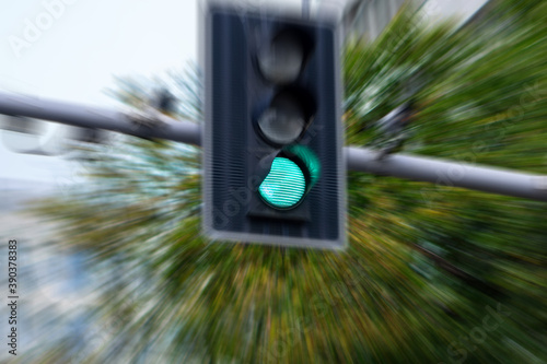 traffic light shines green for cars. blur and motion effect