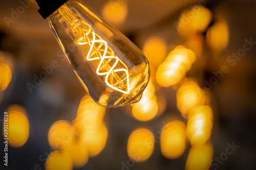 garland of incandescent lamps with blurred background. background, wallpaper
