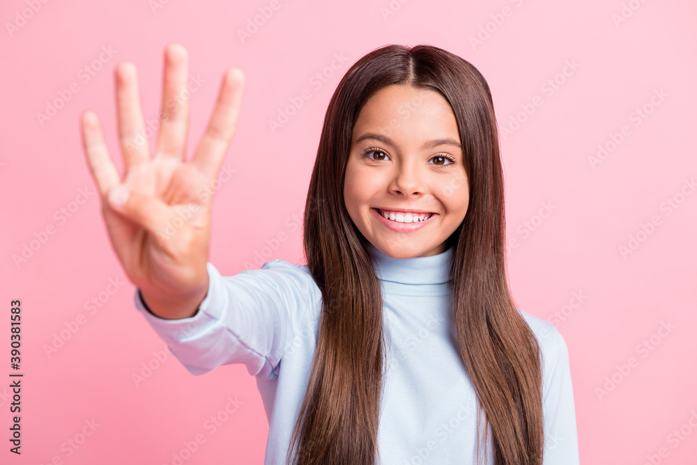 Close-up portrait of charming content cheerful brown-haired girl giving you four fingers isolated over pink pastel color background Close-up portrait of charming content cheerful brown-haired girl giving you four fingers isolated over pink pastel color background