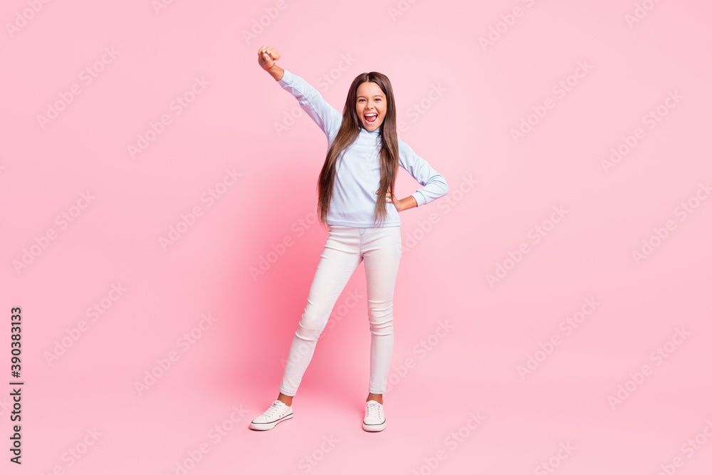 Full length body size view of attractive slender glad cheerful girl dancing celebrating isolated over pink pastel color background