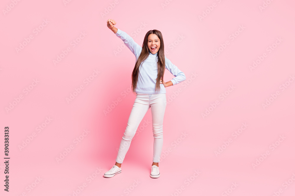 Full length body size view of attractive slender glad cheerful girl dancing celebrating isolated over pink pastel color background Full length body size view of attractive slender glad cheerful girl dancing celebrating isolated over pink pastel color background