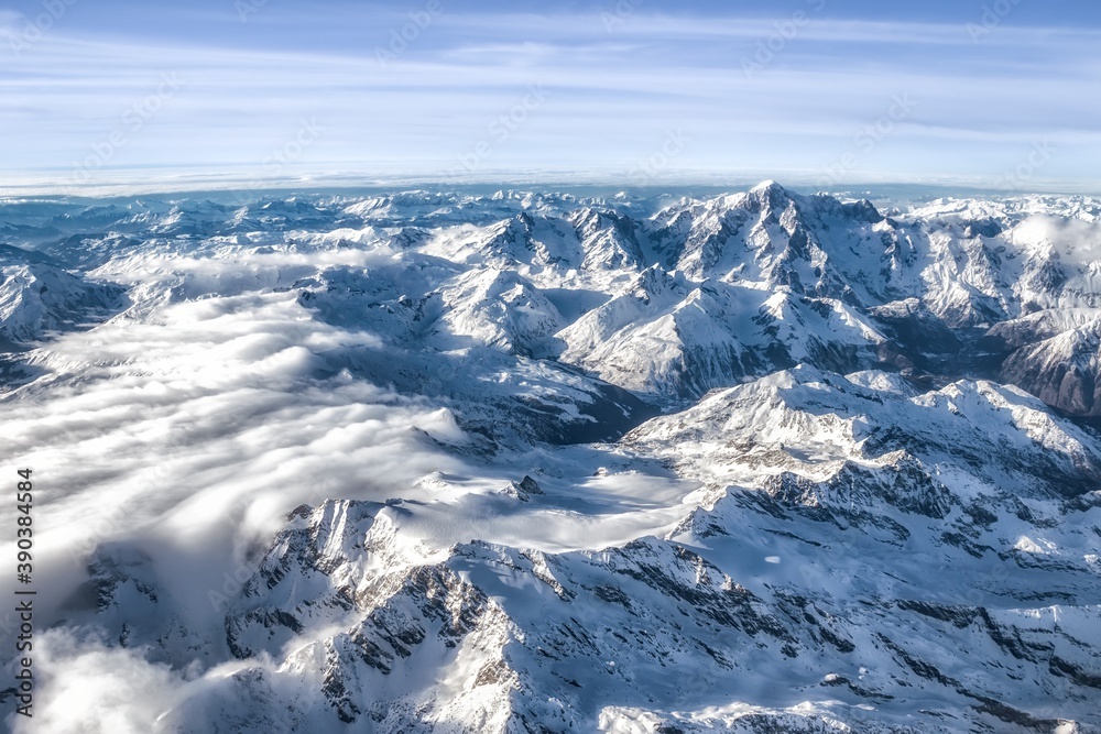 Aerial view of the snow-capped mountain range of the Alps with Mont Blanc on the French-Italian Border.
