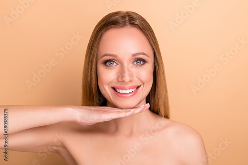 Close-up portrait of her she nice-looking attractive feminine nude naked cheerful cheery confident straight-haired girl pure shine skin aesthetic concept isolated over beige background