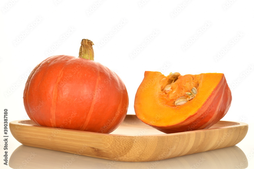 Obraz premium Ripe organic pumpkin, close-up, on a white background.