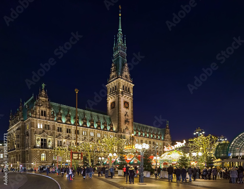 Hamburg, Germany. Christmas market at Town Hall square in front Hamburg Town Hall in dusk. © Mikhail Markovskiy
