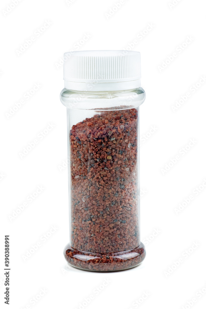 Himalayan black salt in plastic bottle isolated on white Himalayan black salt in plastic bottle isolated on white