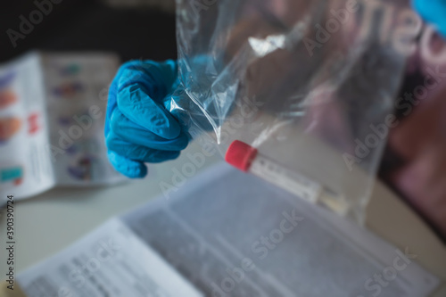Obraz na plátně Process of coronavirus testing examination at home, COVID-19 swab collection kit