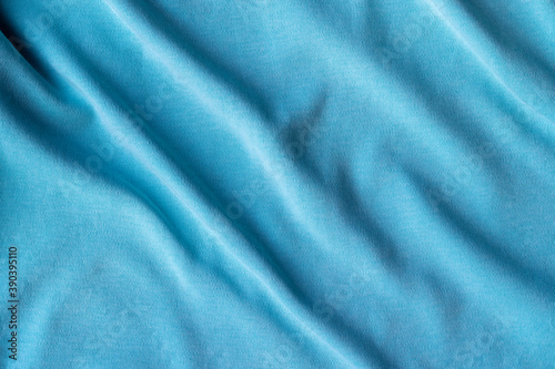 Jersey cotton fabric texture. Crumpled blue textile background