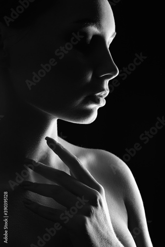 Beautiful Woman silhouette in the dark © eugenepartyzan
