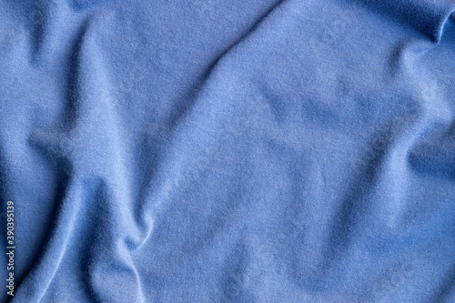 Cotton jersey fabric texture. Crumpled blue textile background