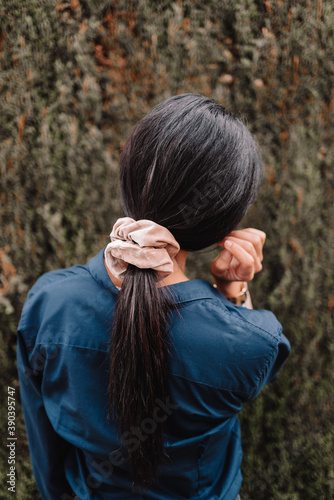 Beautiful woman wearing a scrunchie in the hair